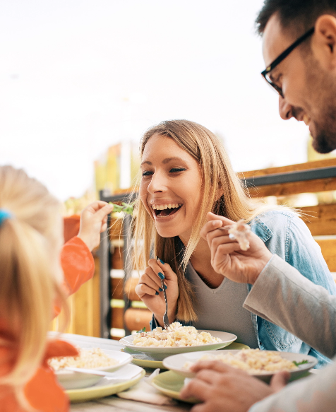 family eating a pasta dish